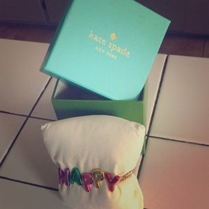 Kate Spayde “Happy” bracelet.